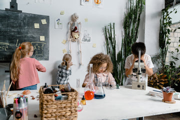 Kids playing around in a science classroom