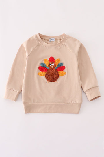 Beige turkey french knot top