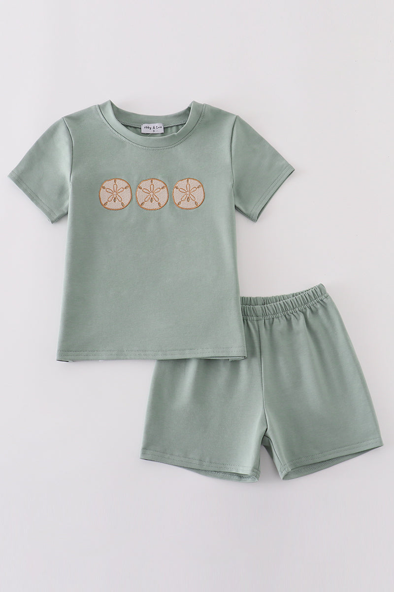 Sage green boy set with sand dollar embroidery, perfect for summer adventures.
