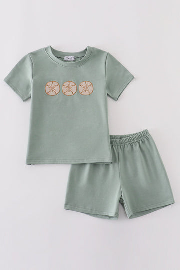 Sage green boy set with sand dollar embroidery, perfect for summer adventures.