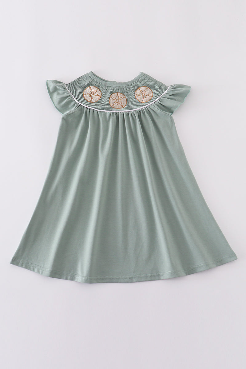 Sage green dress with sand dollar embroidery, perfect for beach outings.