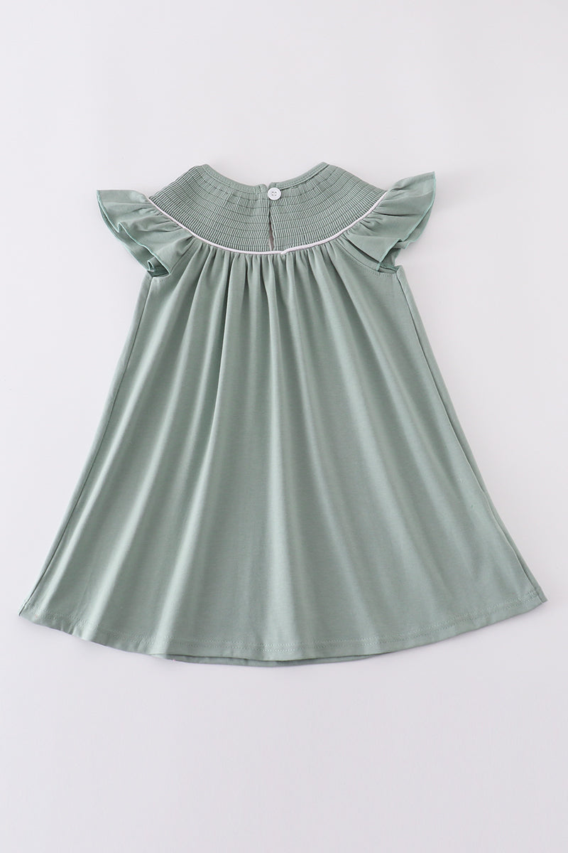 Sage green dress with sand dollar embroidery, perfect for beach outings.