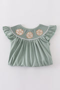 Sage green dress with sand dollar embroidery, perfect for beach outings.