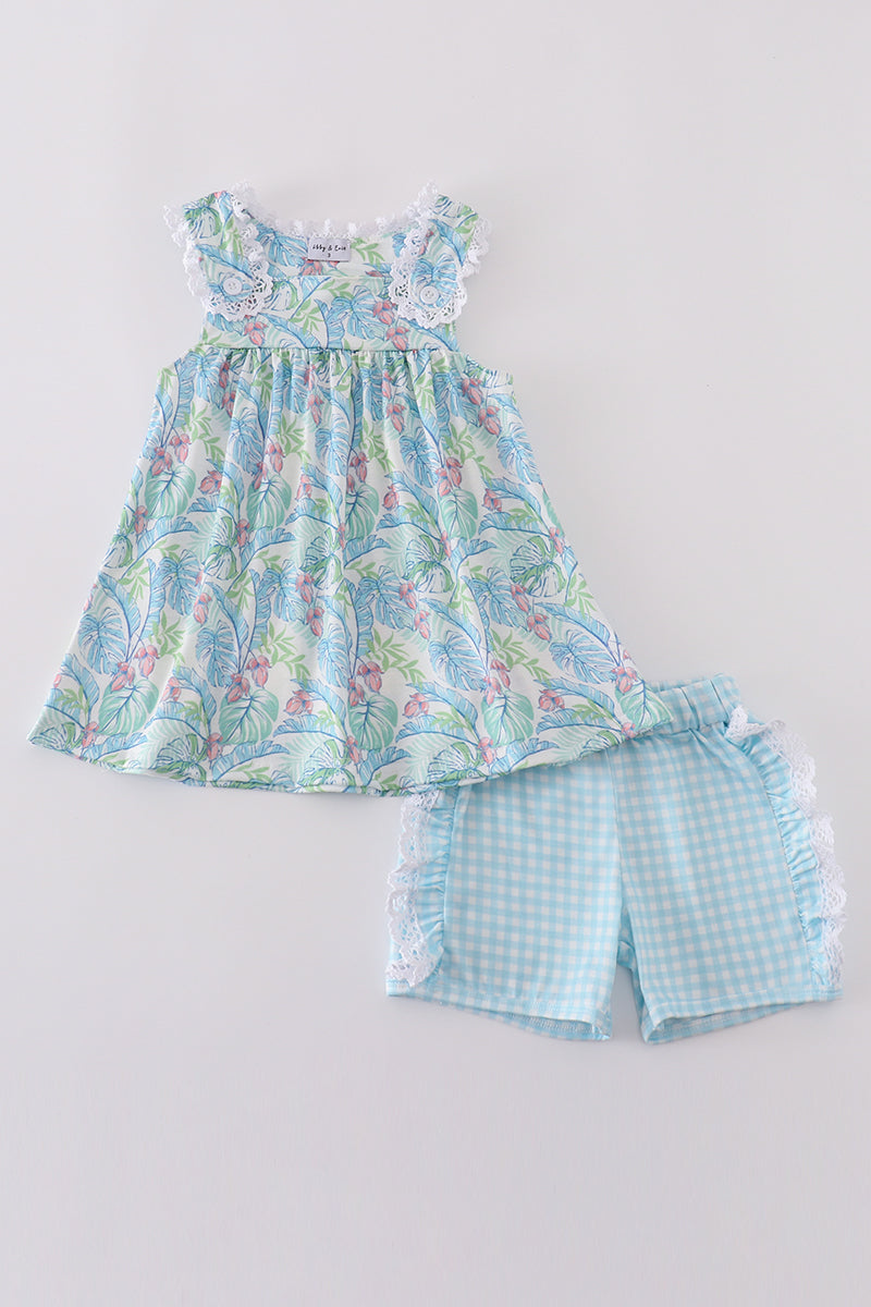 Tropical rainforest plant print kids' set with vibrant green and blue leaves.