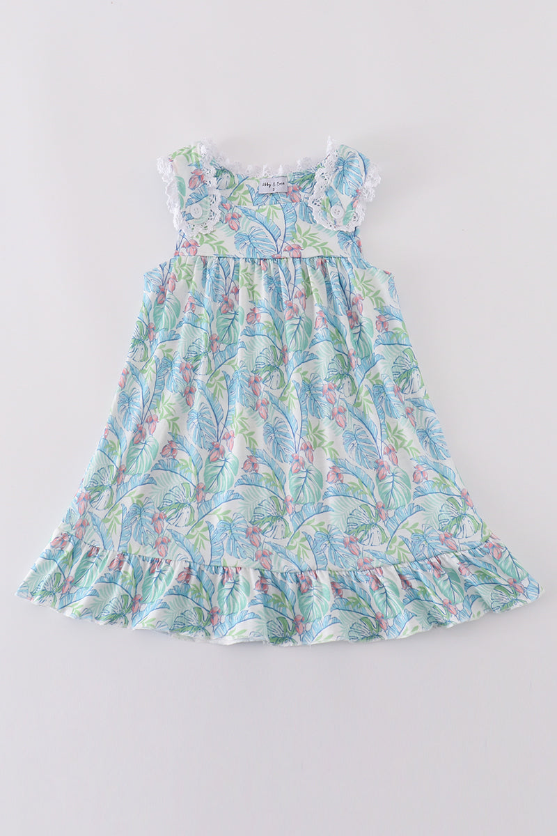 Tropical rainforest plant print dress with vibrant green leaves, perfect for summer fun.