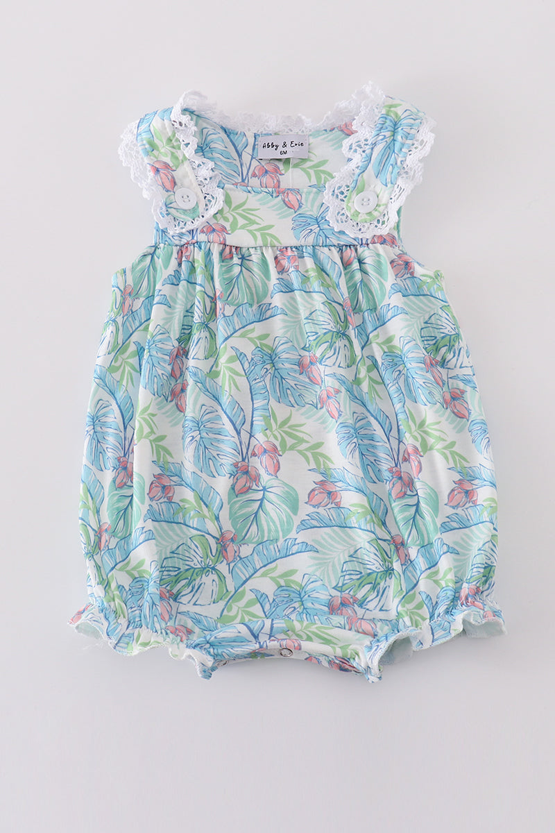 Tropical rainforest print bubble romper with vibrant green leaves, perfect for summer play.