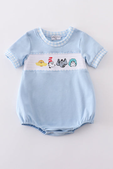 Blue bubble romper with Dr. Seuss embroidery and smocked detailing, perfect for playtime.