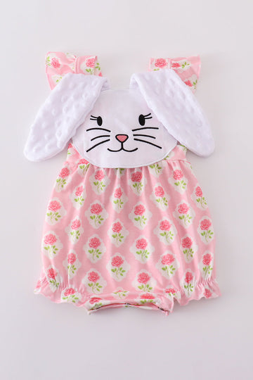 Pink floral bunny applique bubble romper with ruffled sleeves, perfect for spring.