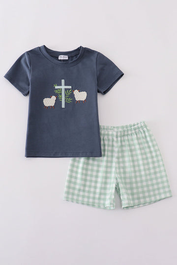 Navy blue boy's set with playful sheep cross embroidery, perfect for cozy days.