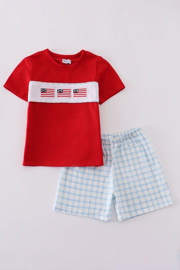 Children's blue flag embroidery set: cozy top and pants with playful flag patterns.