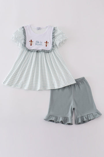 Blue children's outfit with "He is Risen" embroidery, perfect for Easter celebrations.