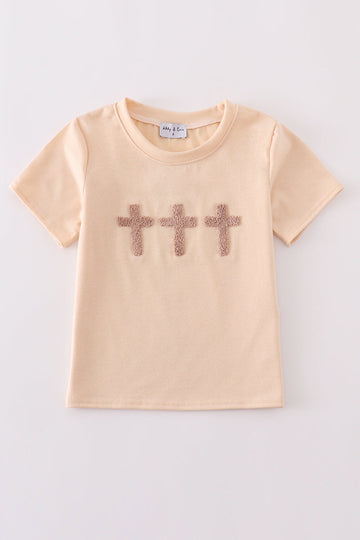 Cream top with delicate cross-stitch knots, perfect for everyday play.