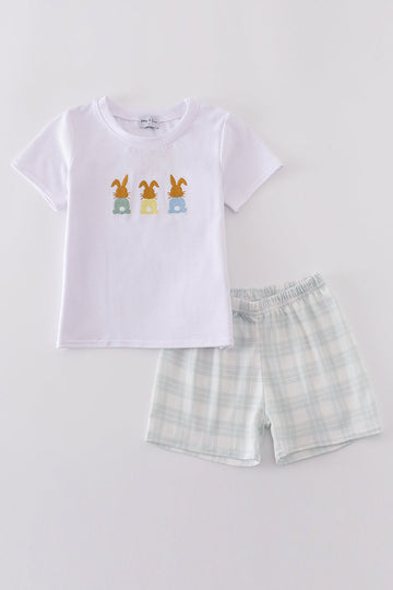 Easter bunny embroidery set with pastel colors on a cozy children's sweater.