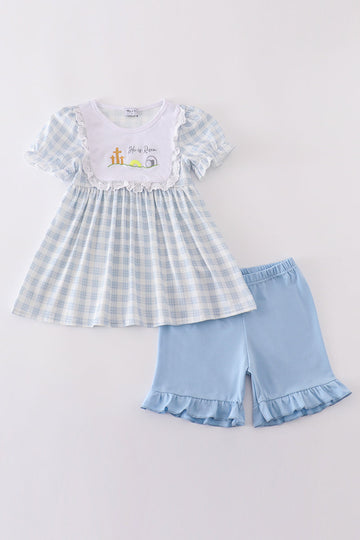 Blue plaid shirt and pants set with "He is Risen" embroidery.