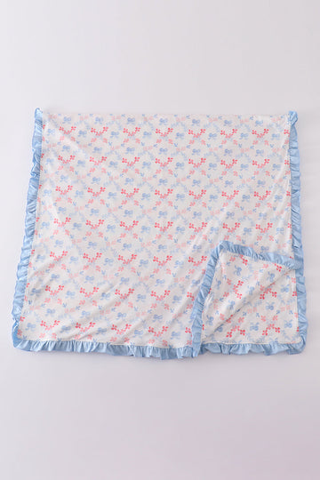 Cozy blue blanket with a charming lattice print and a sweet bow accent.