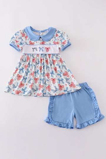 Adorable bow trellis print set with delicate embroidery, perfect for playful adventures.