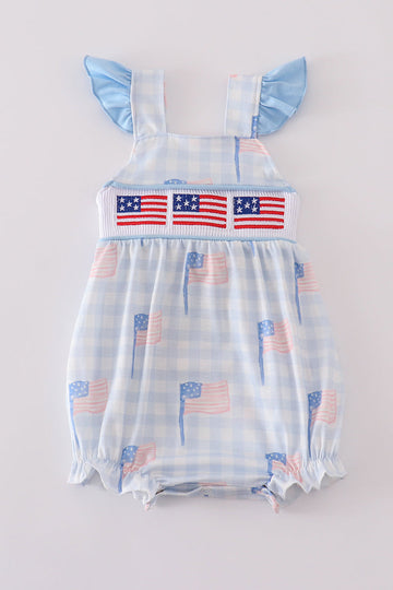A charming gingham bubble romper with blue flag embroidery, perfect for summer.