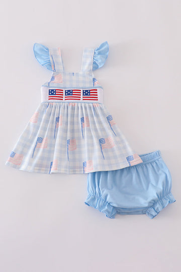 Blue gingham bloomer set with smocked flag embroidery, perfect for summer outings.