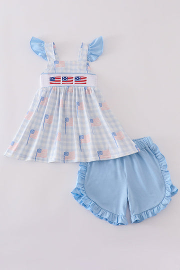 Children's blue smocked shorts set with flag embroidery, perfect for summer outings.