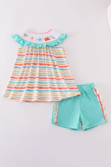 Bright and playful shorts set with rainbow stripes and marine creature embroidery.