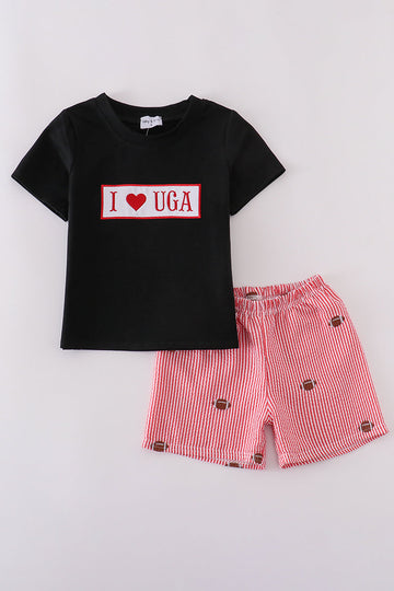 Children's football set with black stripes and "I love UGA" embroidery.