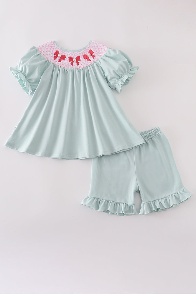 Girl's Blue Bow Pearl Smocked Ruffle Shorts Set with playful, elegant details.