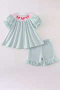 Girl's Blue Bow Pearl Smocked Ruffle Shorts Set with playful, elegant details.