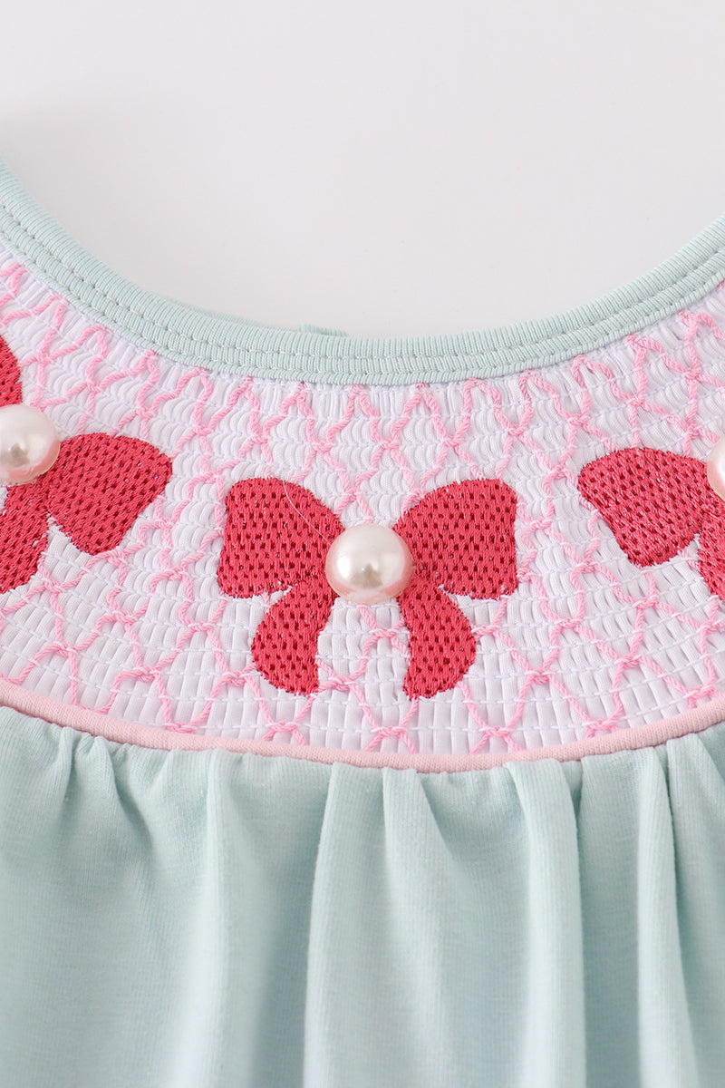 Girl's Blue Bow Pearl Smocked Ruffle Shorts Set with playful, elegant details.