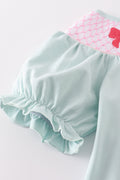 Girl's Blue Bow Pearl Smocked Ruffle Shorts Set with playful, elegant details.