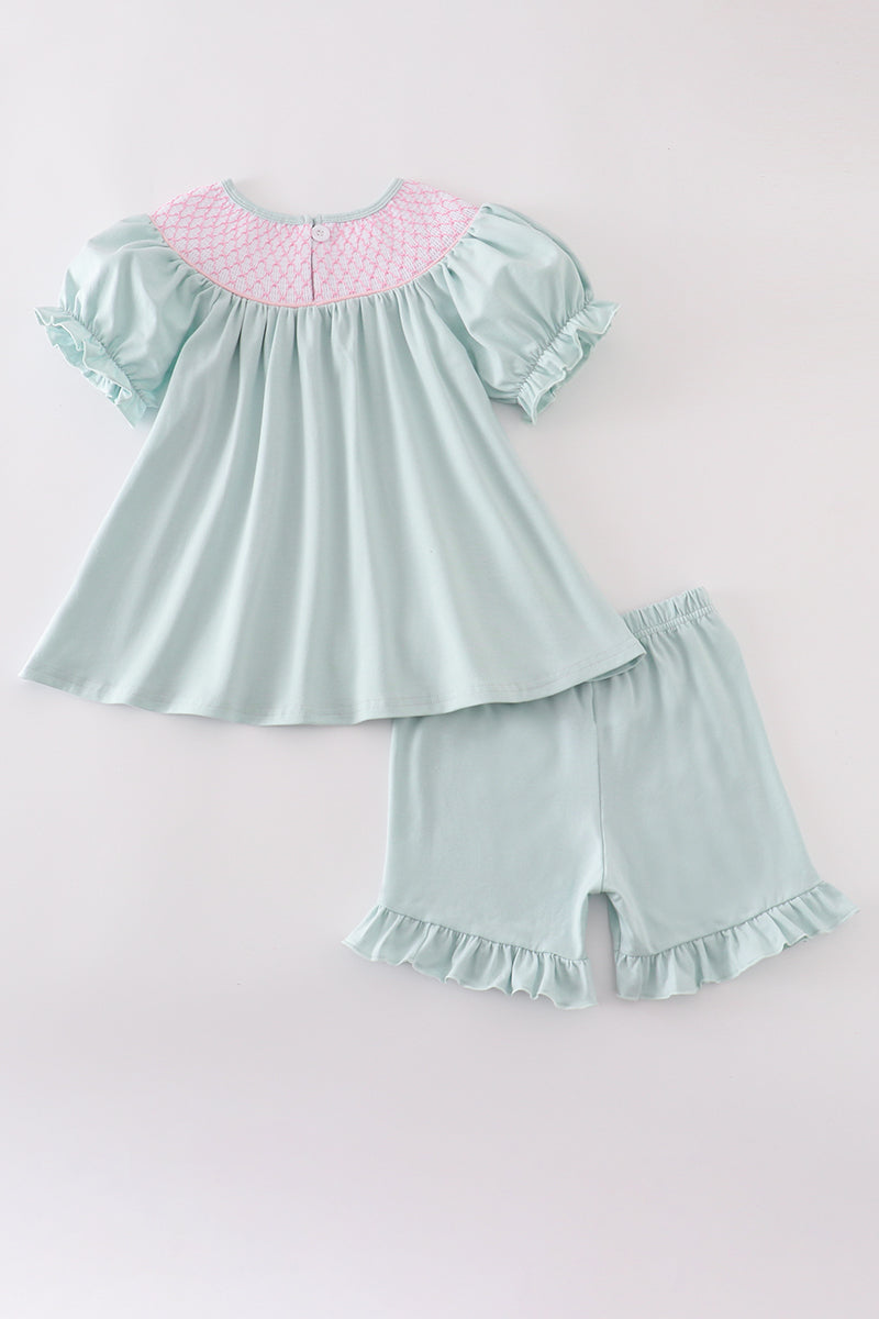 Girl's Blue Bow Pearl Smocked Ruffle Shorts Set with playful, elegant details.