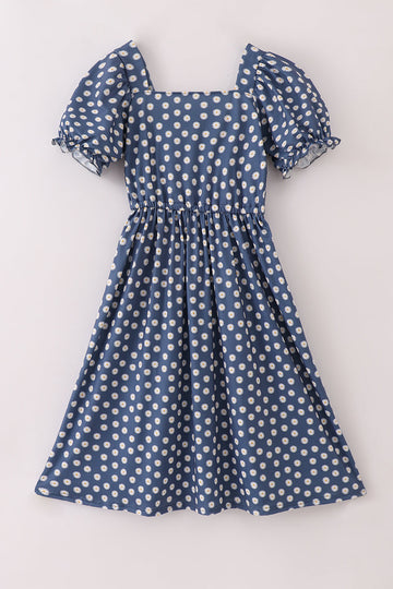 Navy dress with white daisy print, perfect for moms, casual and stylish.