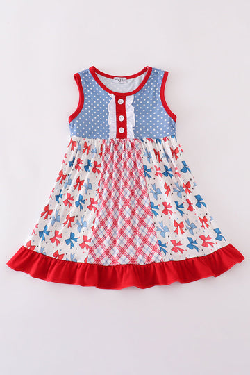 A charming blue dress with playful bow print and ruffled sleeves.