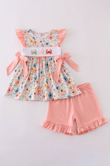 Adorable ruffle shorts set with playful floral crab embroidery, perfect for summer fun.