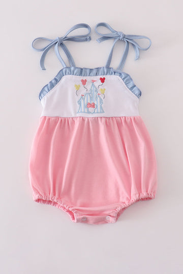 Pink ruffle bubble with castle applique, perfect for playful, fairy-tale adventures.