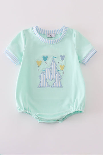 Mint green bubble romper with a whimsical castle applique, perfect for playtime.