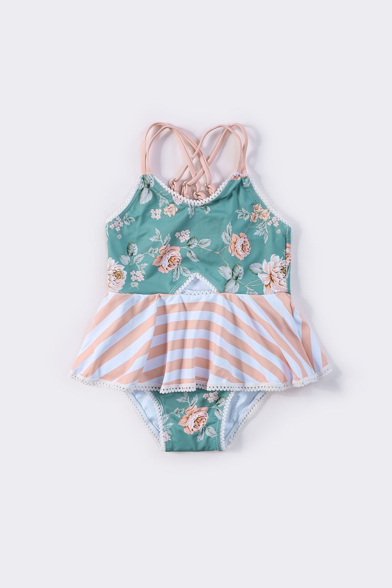 Teal floral print one-piece swimsuit for girls with playful summer vibes.