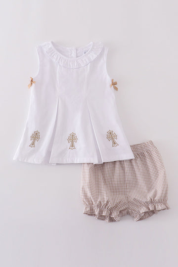 A cozy, embroidered bloomer set with cross patterns, perfect for toddlers.