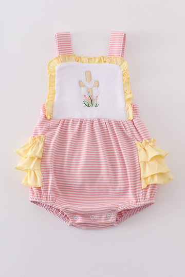 Adorable pink bubble romper with delicate cross embroidery, perfect for special occasions.