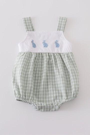 Premium white bubble romper with adorable bunny embroidery, perfect for springtime fun.