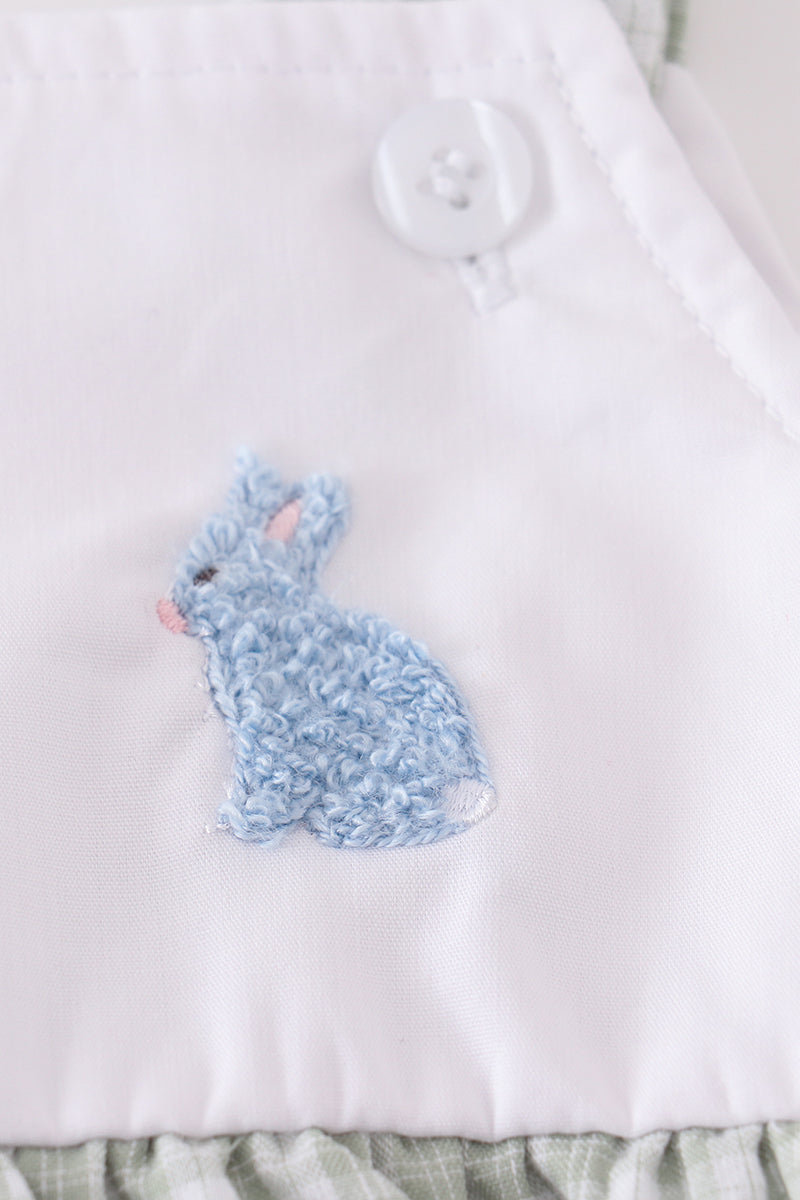 Premium white bubble romper with adorable bunny embroidery, perfect for springtime fun.