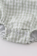 Premium white bubble romper with adorable bunny embroidery, perfect for springtime fun.