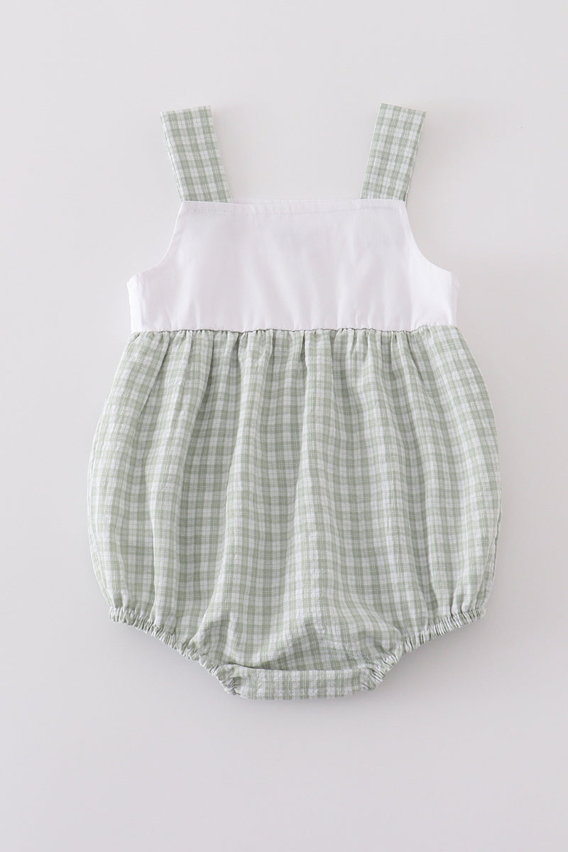 Premium white bubble romper with adorable bunny embroidery, perfect for springtime fun.
