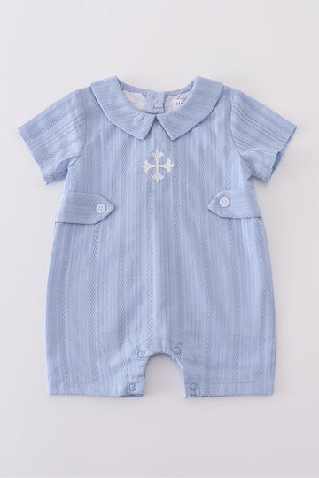 Cozy blue romper with charming cross embroidery, perfect for playful adventures.