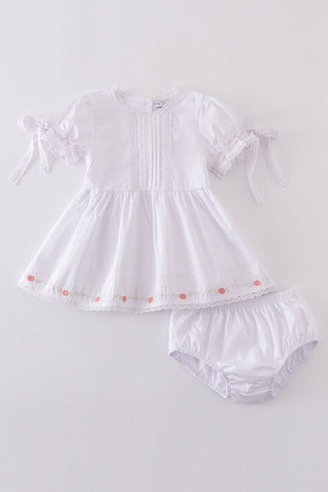 Premium white bloomer set with delicate floral embroidery, perfect for spring outings.