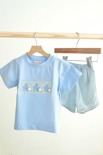 Blue Easter bunny hand-smocked boy set with pastel bunnies and spring flowers.