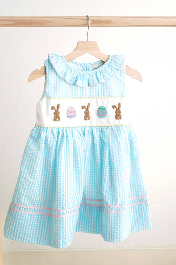 Blue gingham seersucker dress with Easter bunny and egg French knot design.