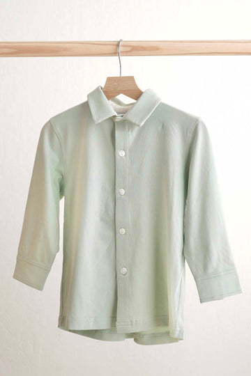 Sage green button-down shirt for boys, perfect for casual or formal occasions.