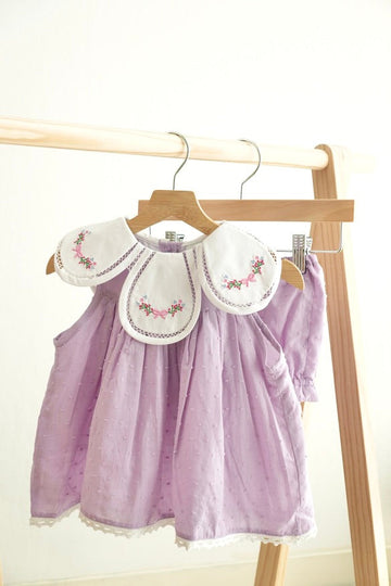 Lavender floral embroidered girl bloomer set with Swiss dots and bow detail.