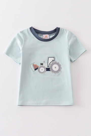 Green long-sleeve top with playful excavator applique, perfect for adventurous boys.