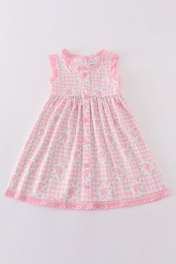 Pink Barbie print dress for girls, featuring playful, colorful patterns.